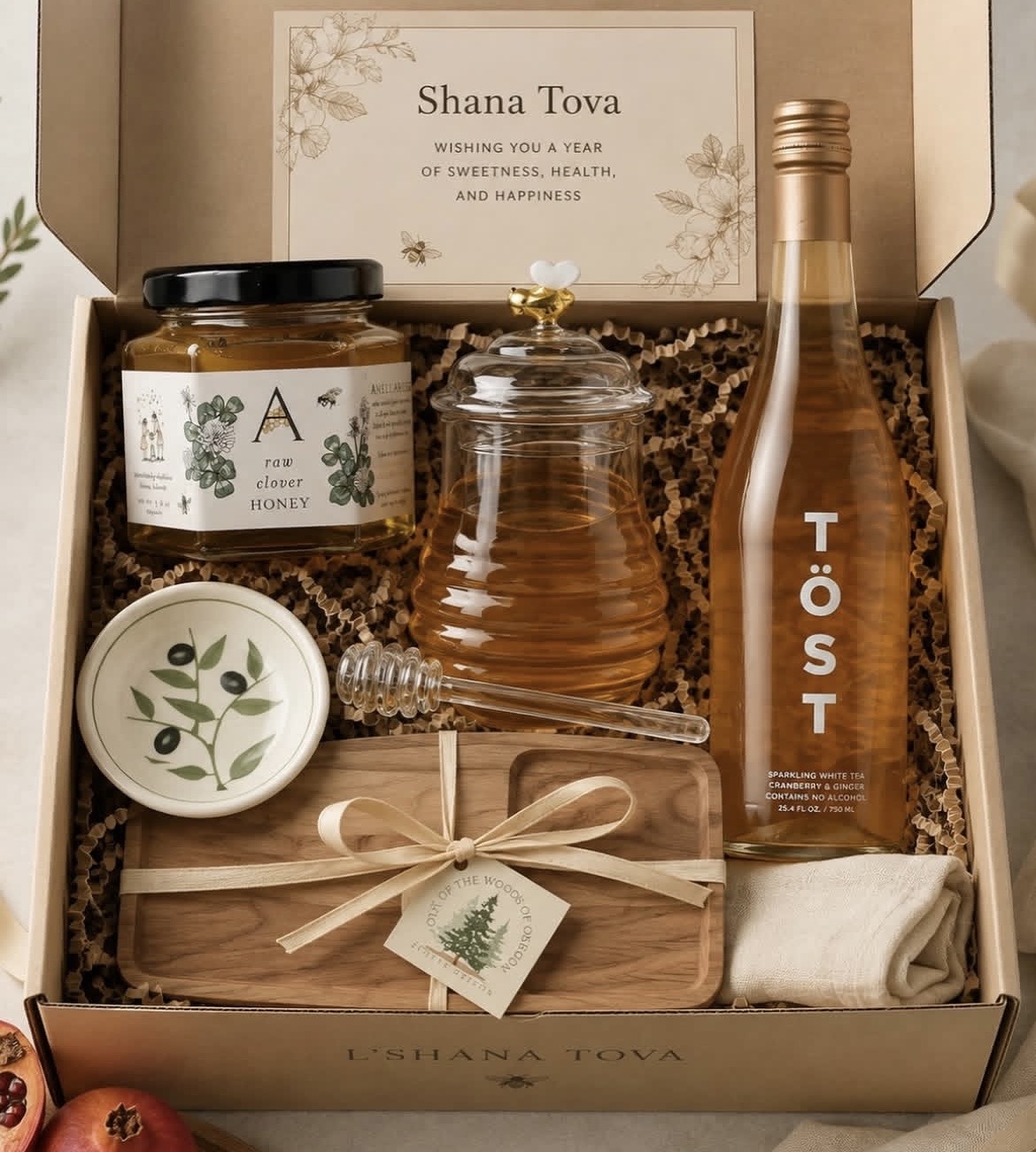 Shana Tova gift box with honey, honey jar and a sparkling tea bottle